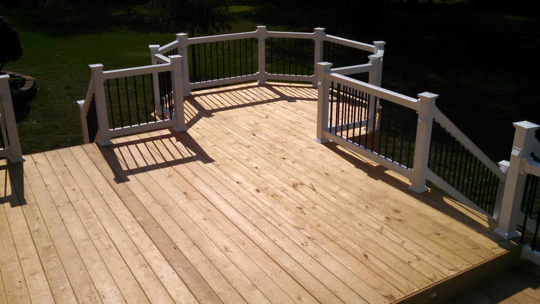 Buckstone: Akron Deck Builders - Treated deck with vinyl rail Copley Ohio Deck Picture by Buckstone